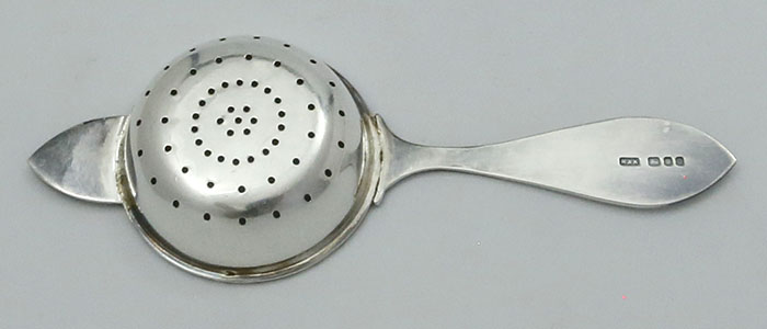 English hallmarked silver tea strainer